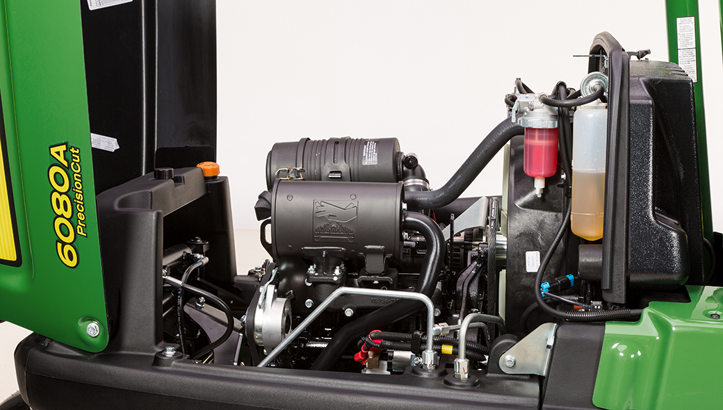 Close up of the 6080A PrecisionCut™'s 3-cylinder engine