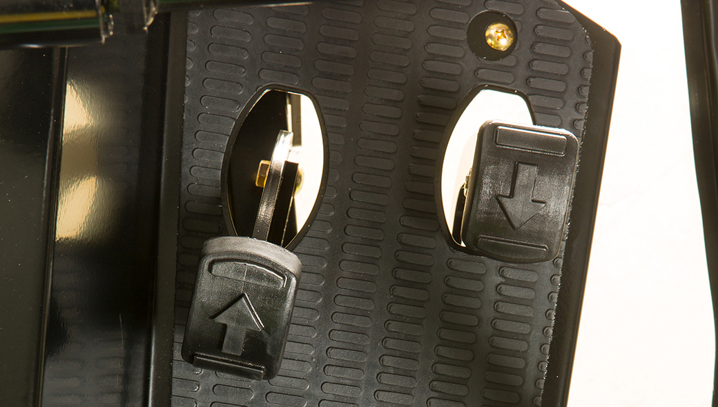 Close-up view of the forward and reverse pedals on the 1220 TruFinish Utility Rake